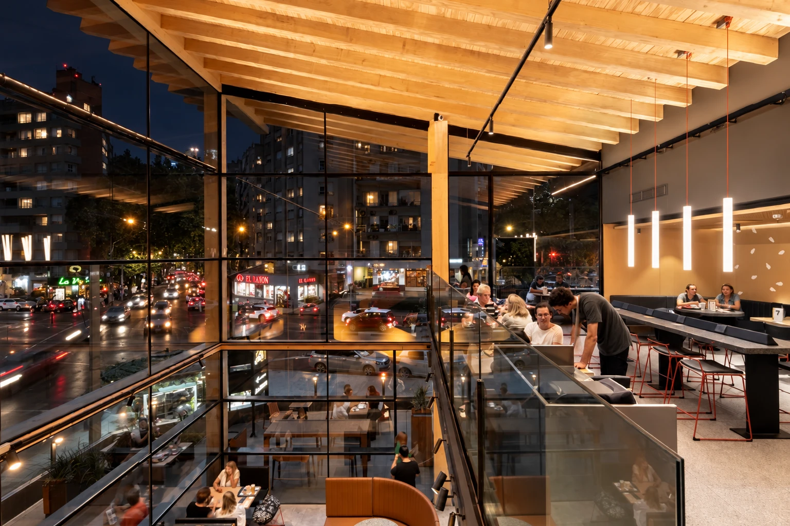 Sistema de riel lineal en café de diseño con vista urbana · Green Ray LED
